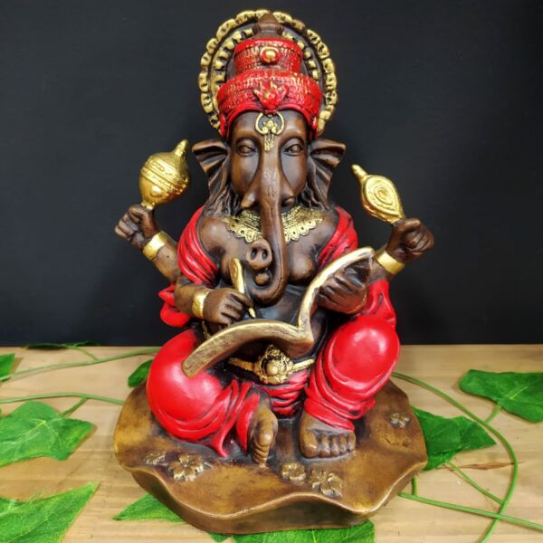 GANESHA COM LIVRO ENVELHECIDA COM VERMELHO 25CM